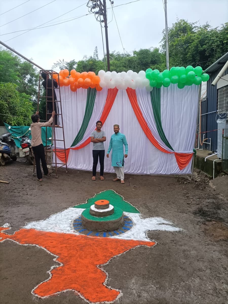 Tricolour decorations and rangoli at the madrasa