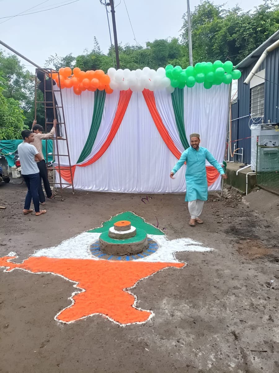 Tricolour decorations and rangoli at the madrasa