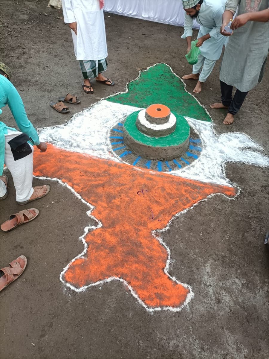 Tricolour decorations and rangoli at the madrasa