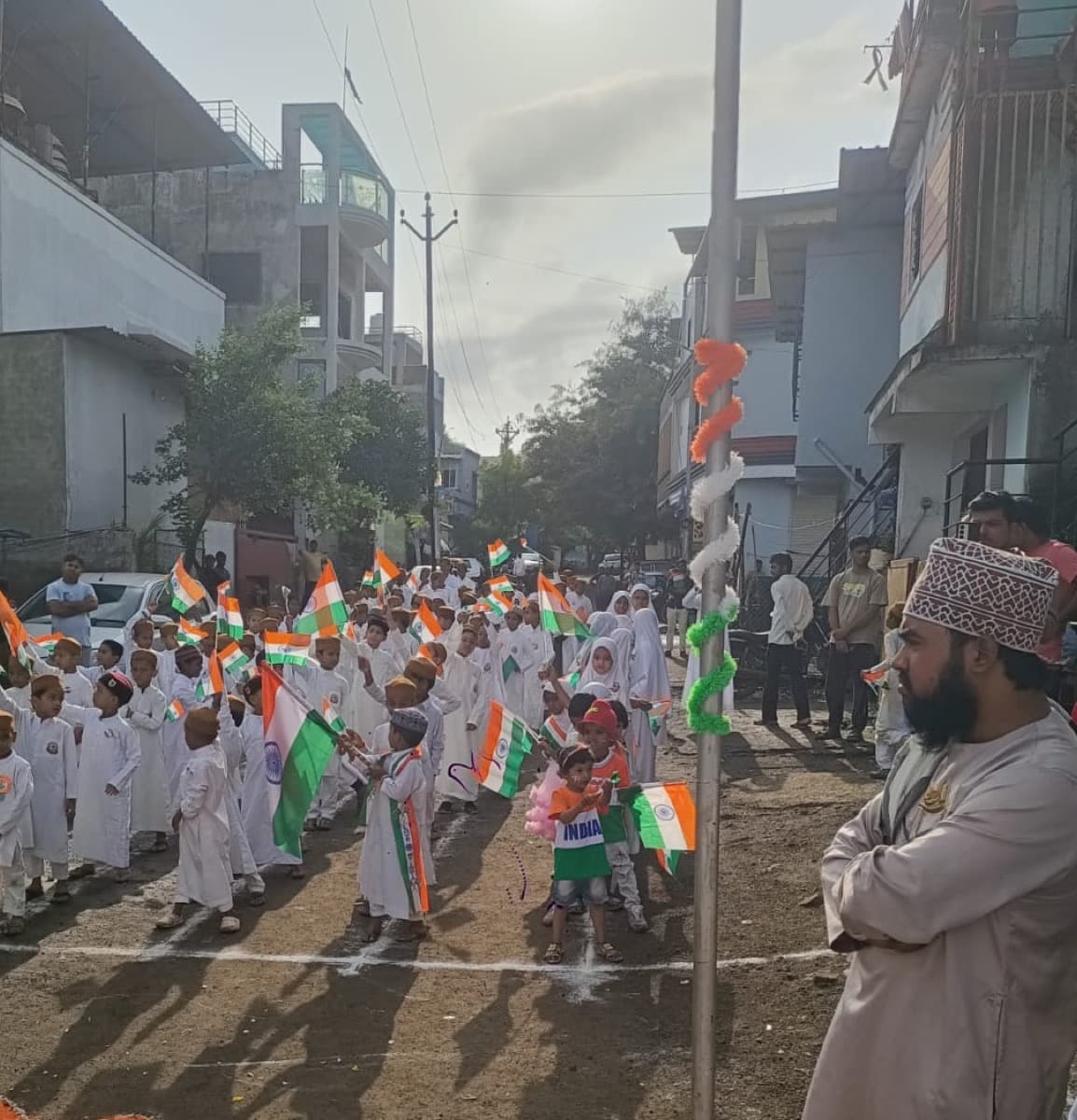 Students carrying the national flag