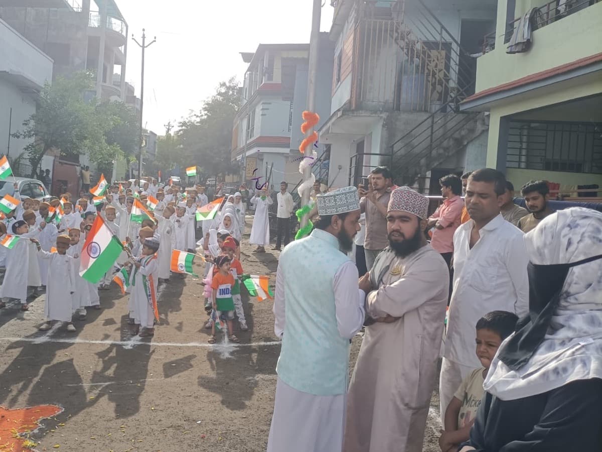 Students carrying the national flag